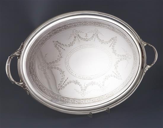 A Victorian silver oval two handled tea tray by Horace Woodward & Co, 86.5 oz.